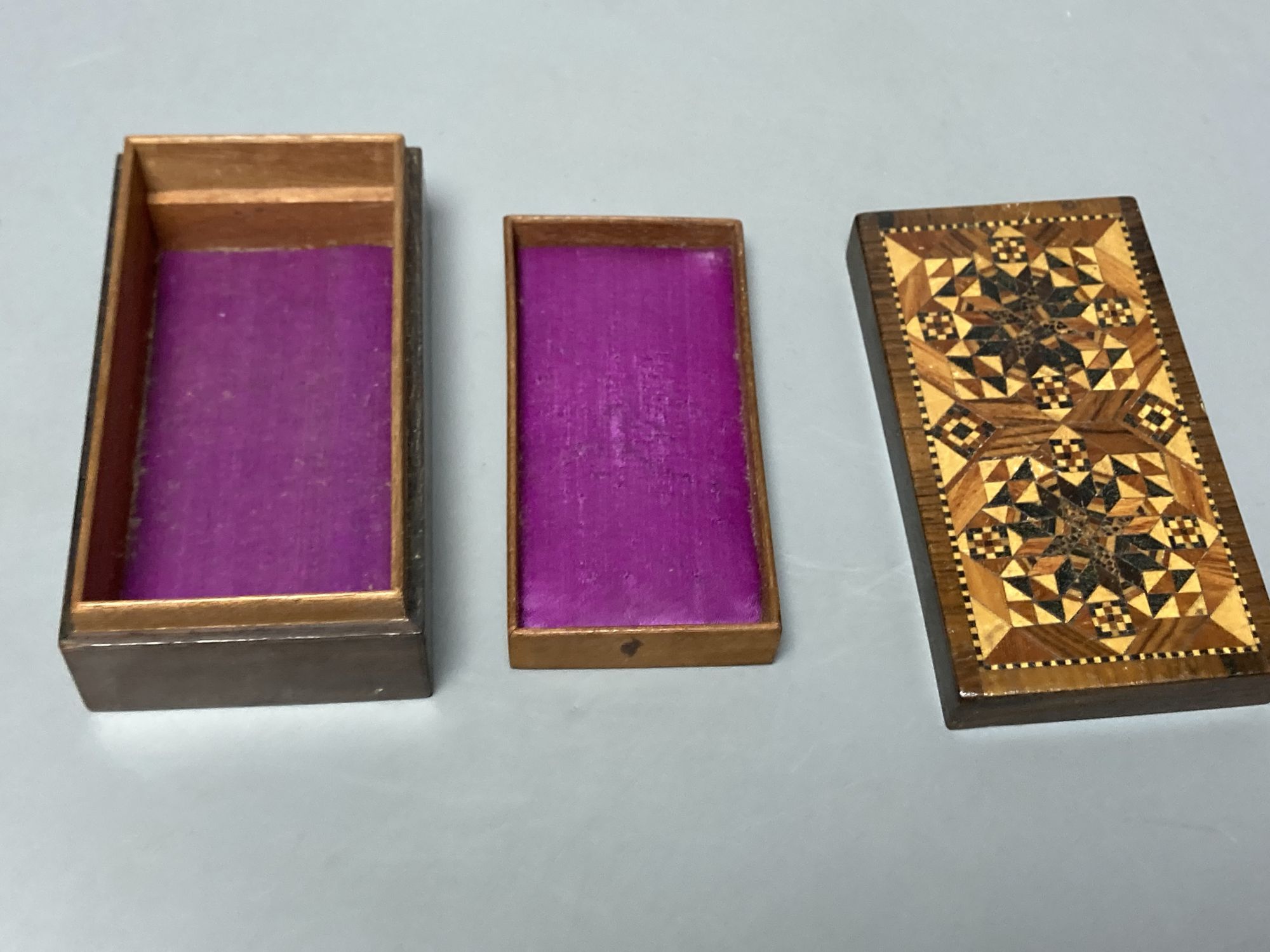 A Tunbridge ware mosaic lidded tangram puzzle and a half square mosaic box with inner tray, mid 19th century, 5cm and 11.6cm (2)